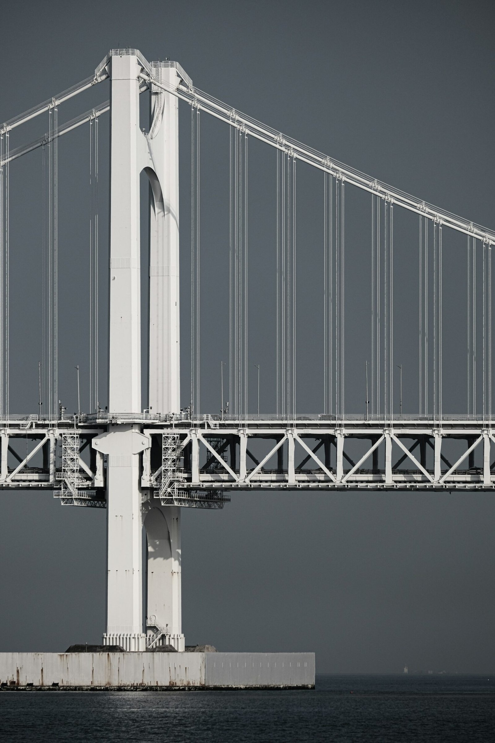 Well-designed modern bridge connecting two points in minimalist style, symbolizing how alt text bridges the gap between product images and visually impaired users
