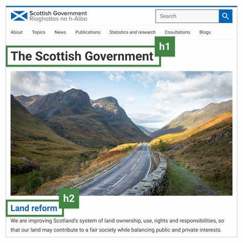 A scenic road winds through a lush valley flanked by steep, green mountains with patches of yellow and brown autumn foliage. The road is empty, bordered by a stone wall on the right and a grassy verge on the left. The sky is bright with scattered white clouds. At the top, the text "The Scottish Government" in bold, green letters appears. Below, the words "Land reform" are written in smaller, green text. A subtle message reads, "We are improving Scotland's system of land ownership, use, rights, and responsibilities,...